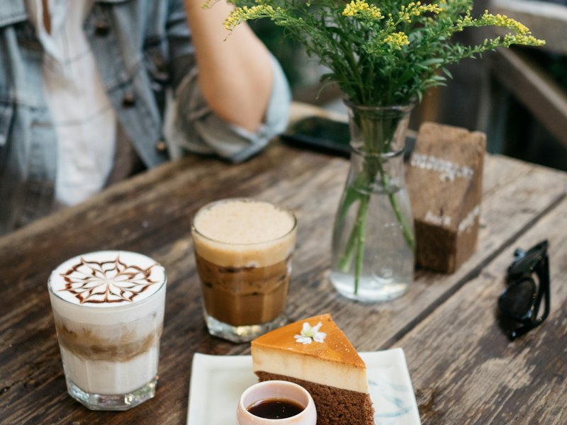 Coffee and cake on a cafe table