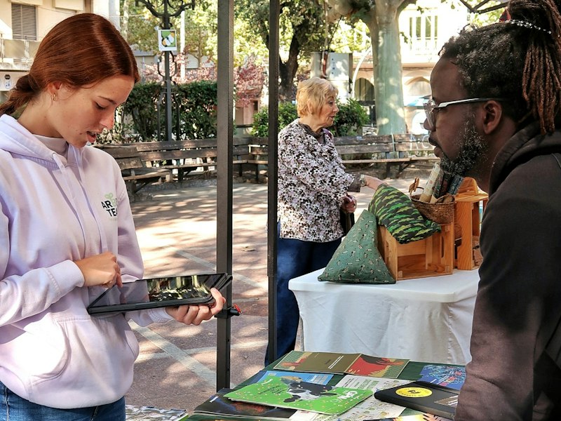 Volunteers at a community information stall