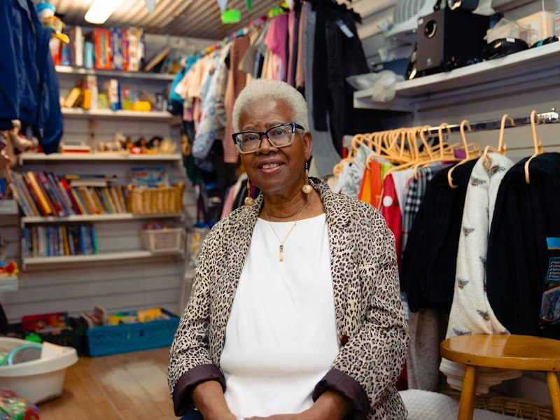 Smiling woman in a local shop